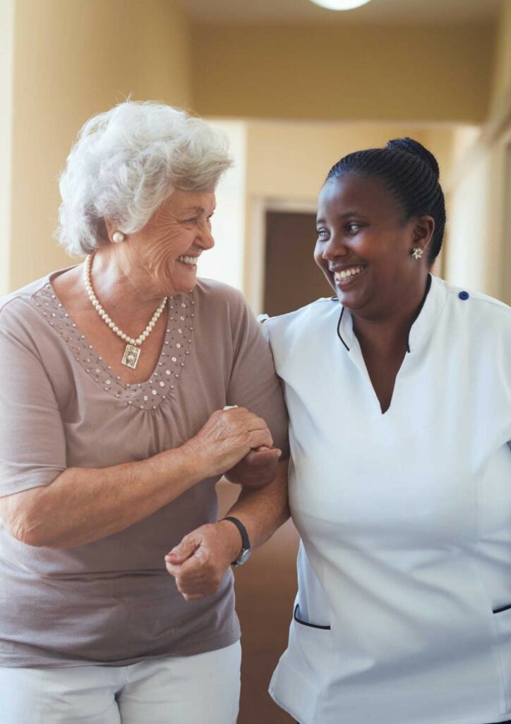 Caregiver walking with patient